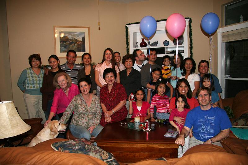 IMG_0259.jpg - Family with dog and ... what's he doing?