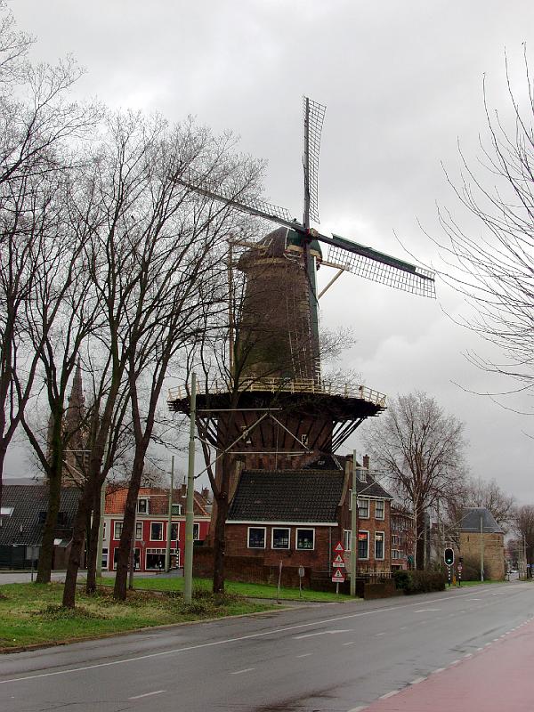 DelftWindmill.jpg - Windmill in Delft.  A bit of the old city wall is on the right of the photo.