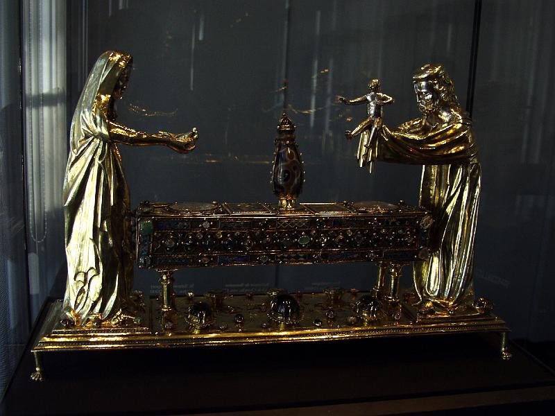 P7176743.jpg - Small baptismal statue with many semi-precious stones