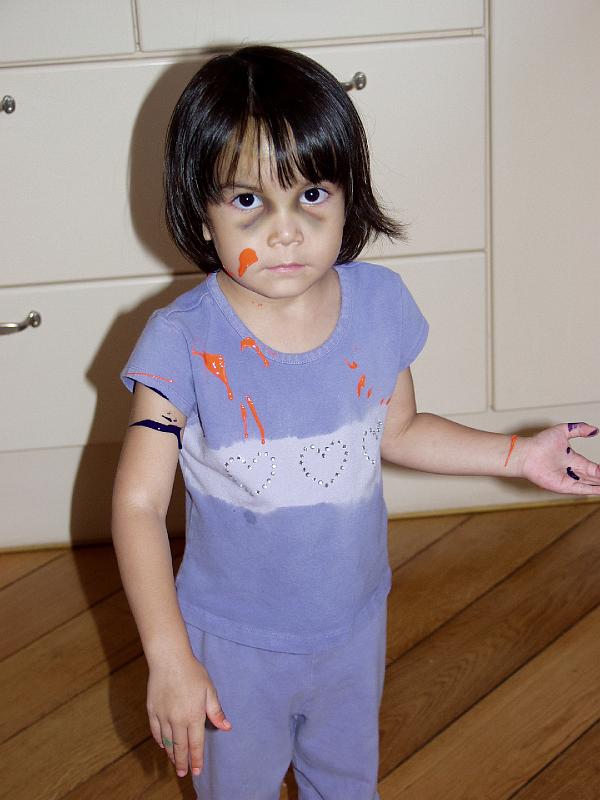 P7126671.jpg - Thanks for the paints grandma!  You can see her racoon look after her tumble from the stairs.